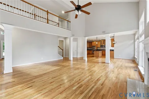 a kitchen with stainless steel appliances granite countertop a sink a stove and a microwave