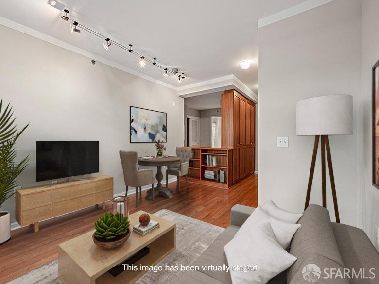 1701 Jackson Street, Unit 105 San Francisco, CA 94109 - Photo 1 of 43 a living room with furniture and a flat screen tv