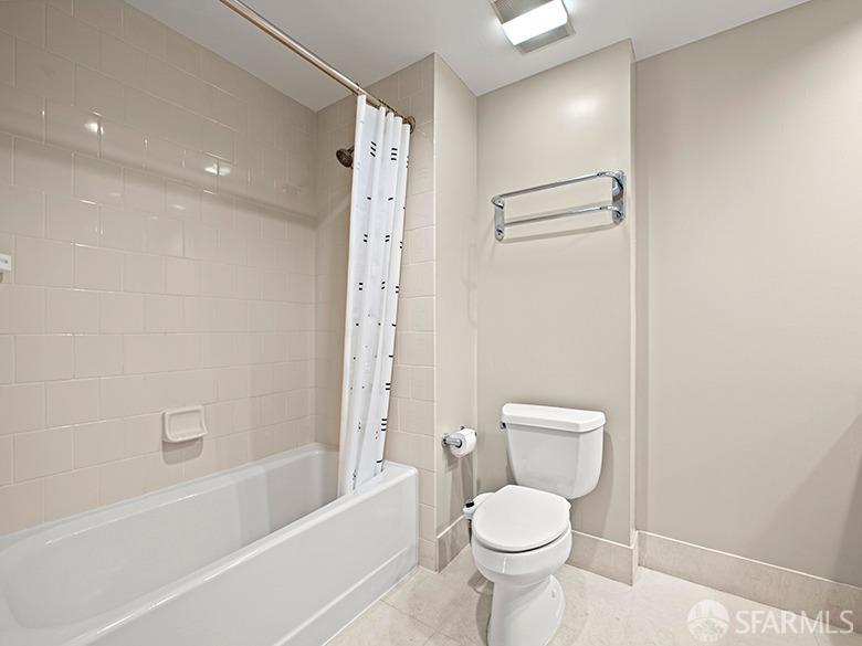 1701 Jackson Street, Unit 105 San Francisco, CA 94109 - Photo 11 of 43 a bathroom with a toilet and a bathtub