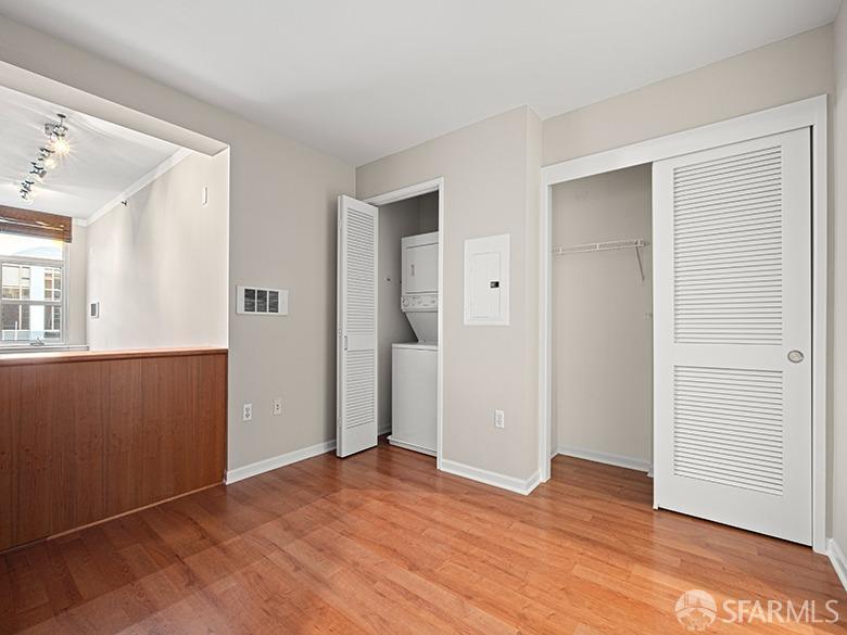 1701 Jackson Street, Unit 105 San Francisco, CA 94109 - Photo 13 of 43 a view of empty room with wooden floor