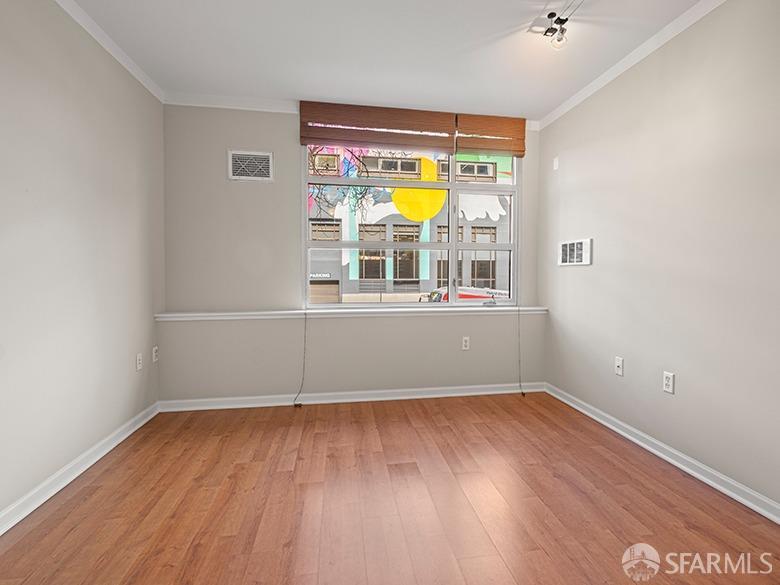 1701 Jackson Street, Unit 105 San Francisco, CA 94109 - Photo 24 of 43 an empty room with a window