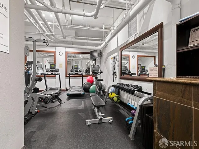 a view of a room with gym equipment