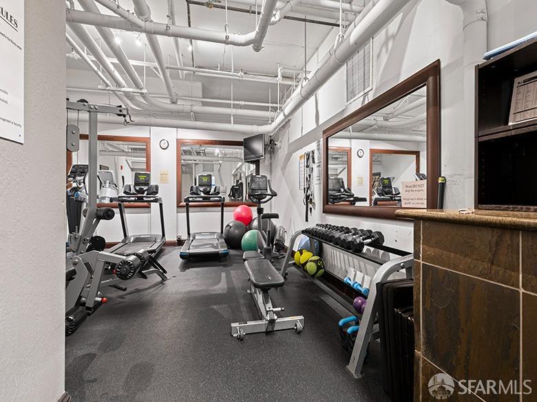 1701 Jackson Street, Unit 105 San Francisco, CA 94109 - Photo 29 of 43 a view of a room with gym equipment