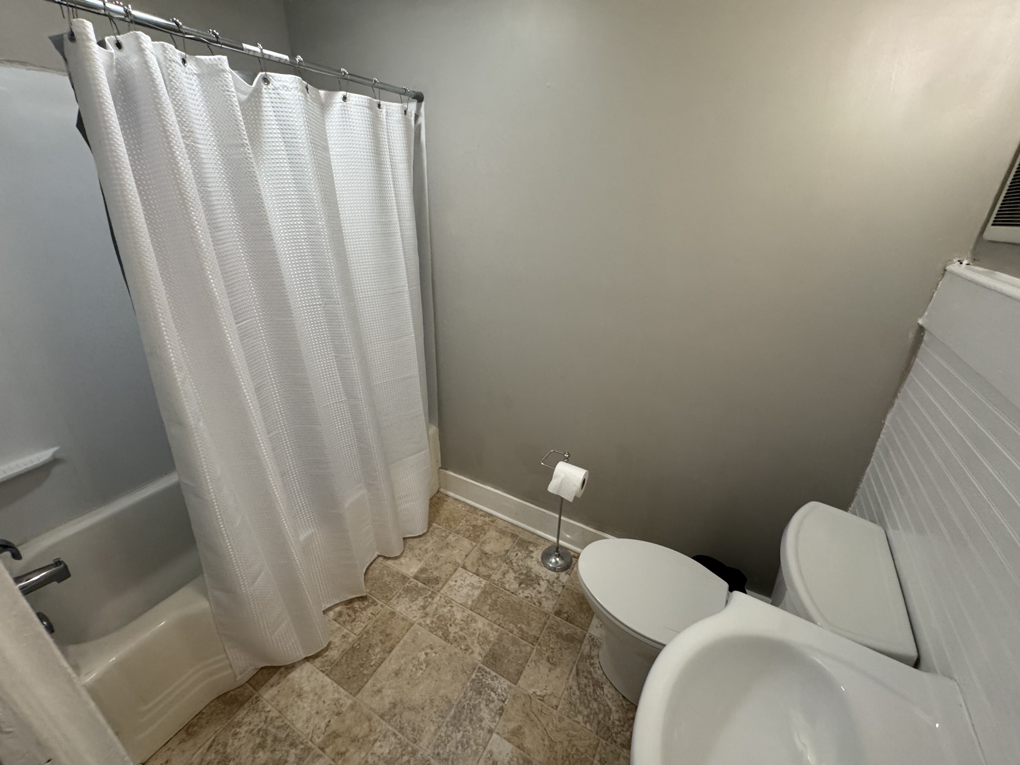 226 North Highland Avenue, Unit 4 Murfreesboro, TN 37130 - Photo 6 of 9 a bathroom with sink and toilet
