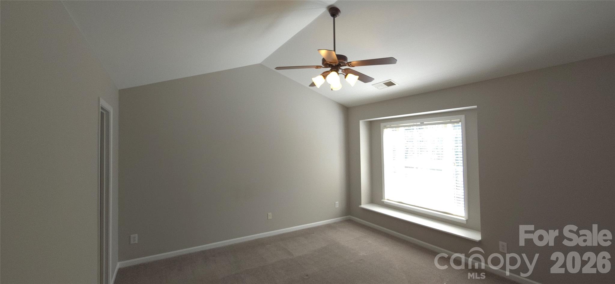 11542 Rabbit Ridge Road Charlotte, NC 28270 - Photo 16 of 33 a view of an empty room with a window