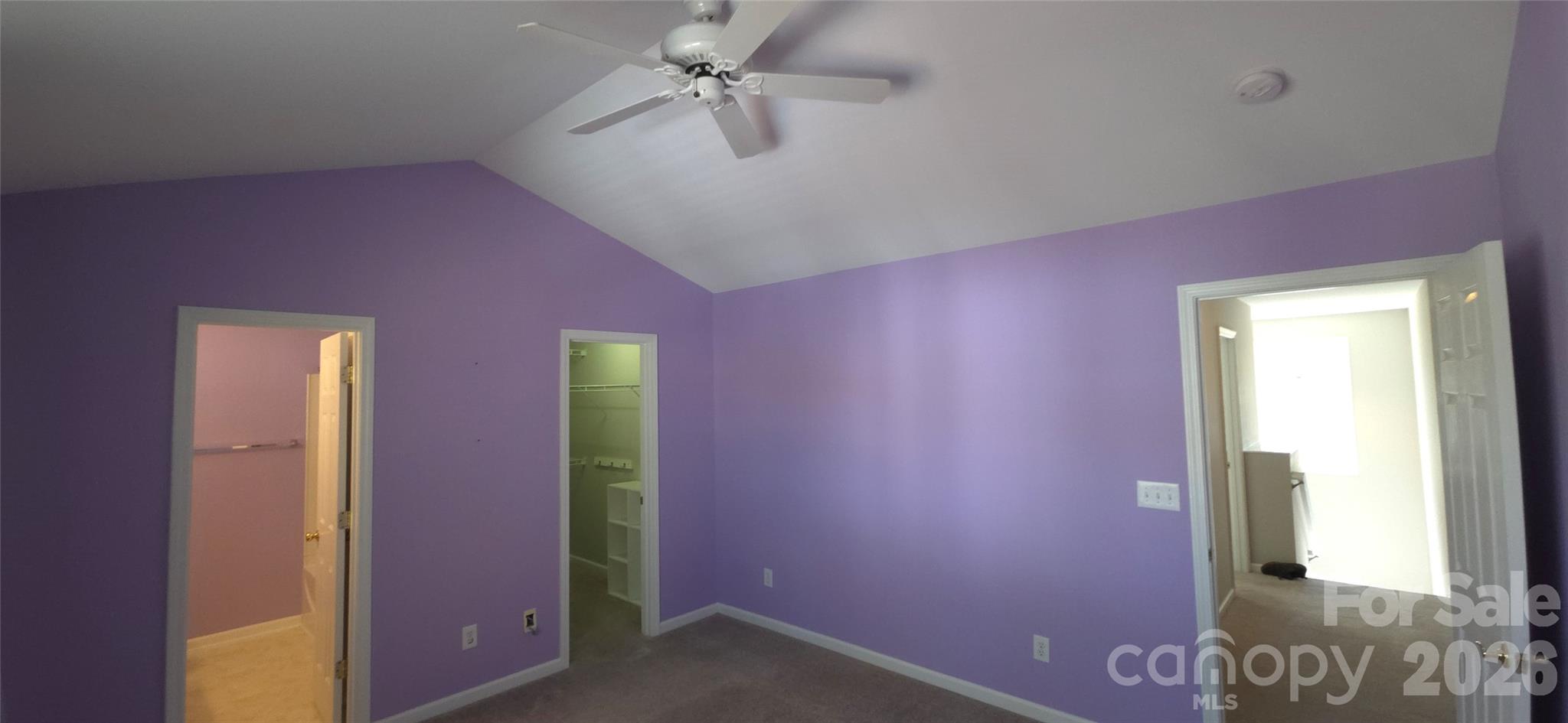 11542 Rabbit Ridge Road Charlotte, NC 28270 - Photo 23 of 33 an empty room with windows and fan