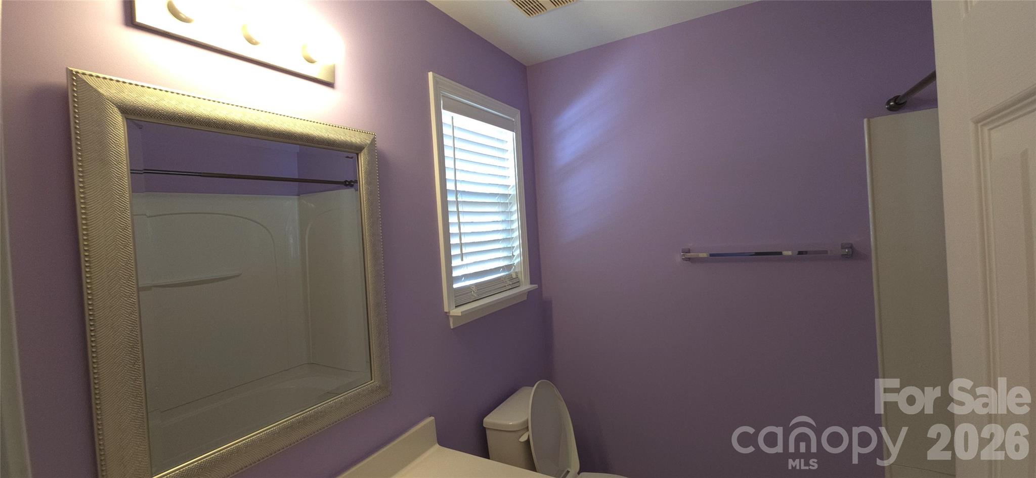 11542 Rabbit Ridge Road Charlotte, NC 28270 - Photo 24 of 33 a bathroom with a window