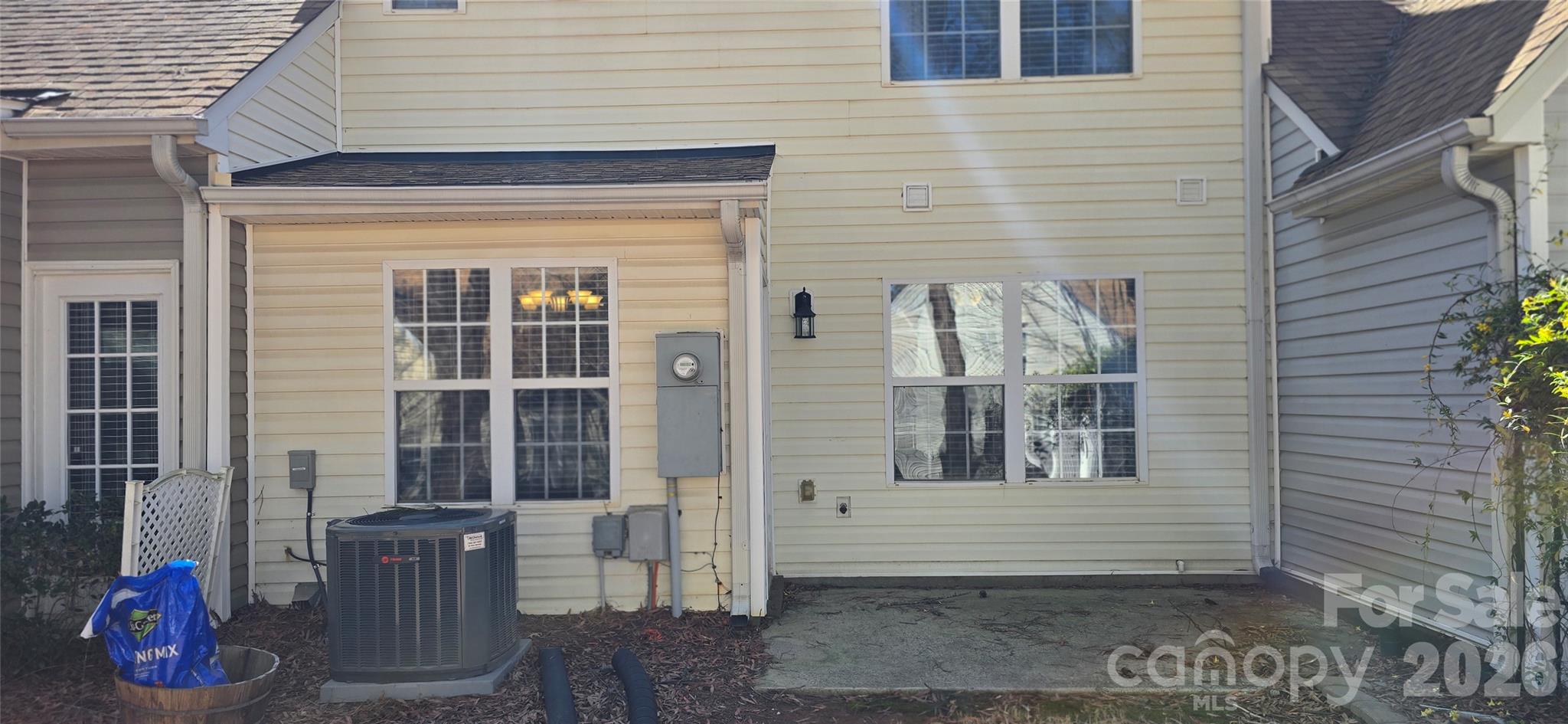 11542 Rabbit Ridge Road Charlotte, NC 28270 - Photo 29 of 33 a front view of a house with outdoor seating