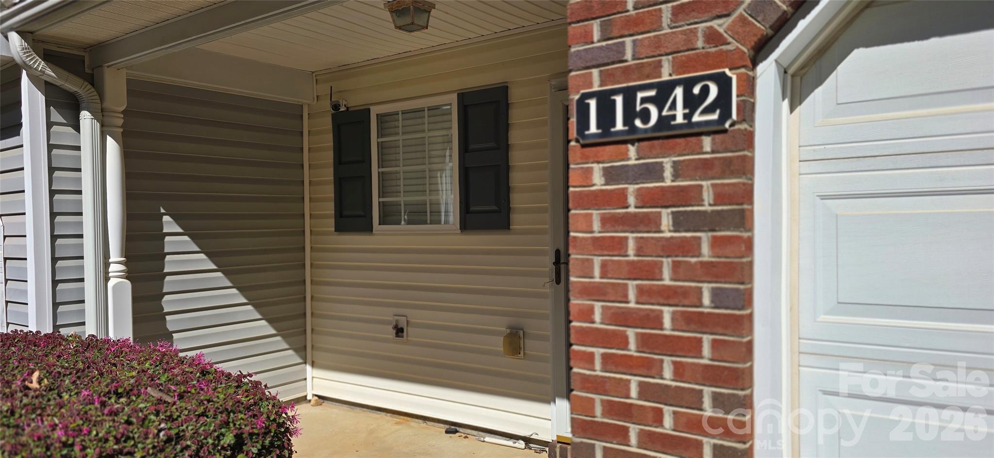 11542 Rabbit Ridge Road Charlotte, NC 28270 - Photo 3 of 33 a view of a door with a window