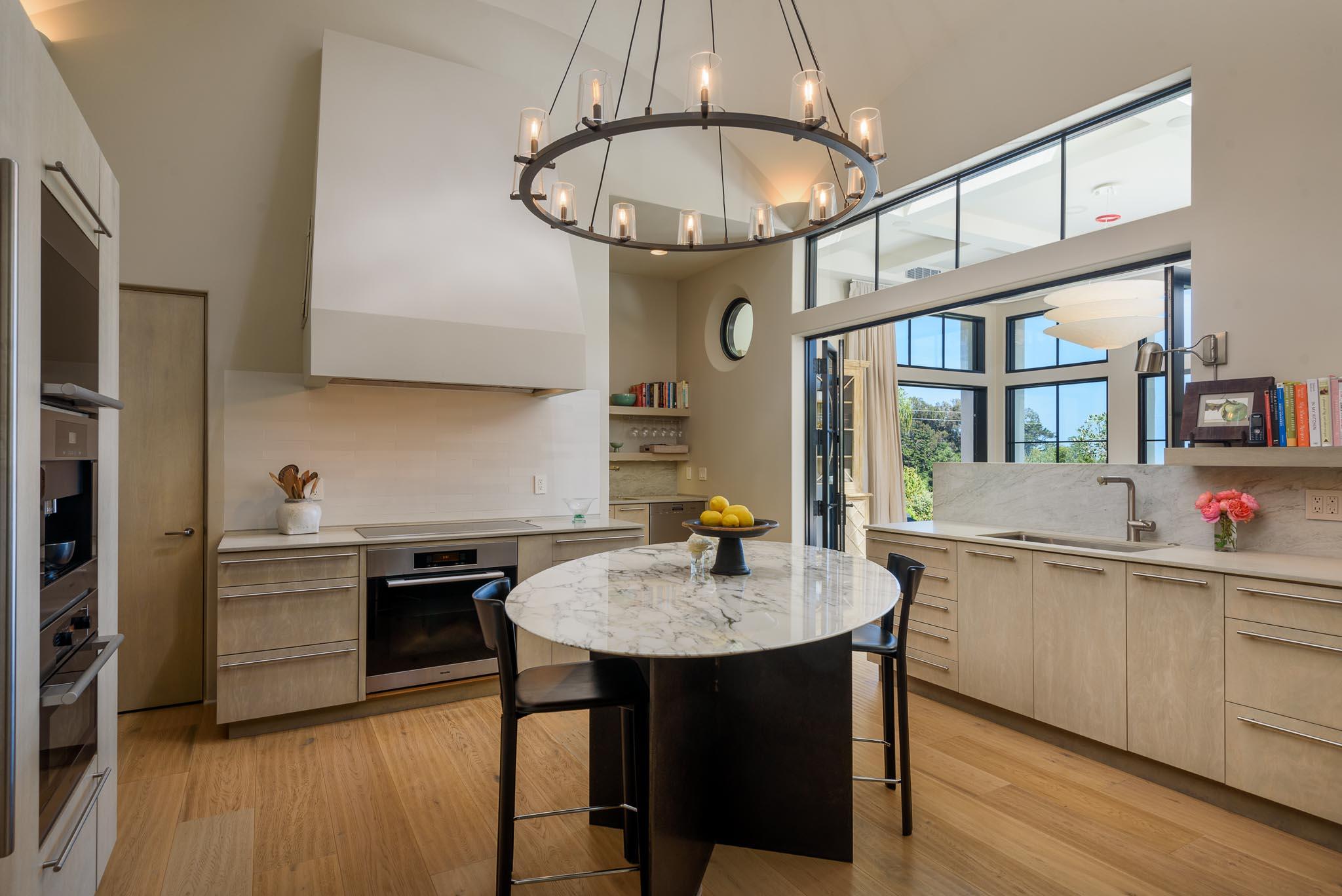 698 El Rancho Road Montecito, CA 93108 - Photo 11 of 24 a kitchen with stainless steel appliances a sink stove and refrigerator