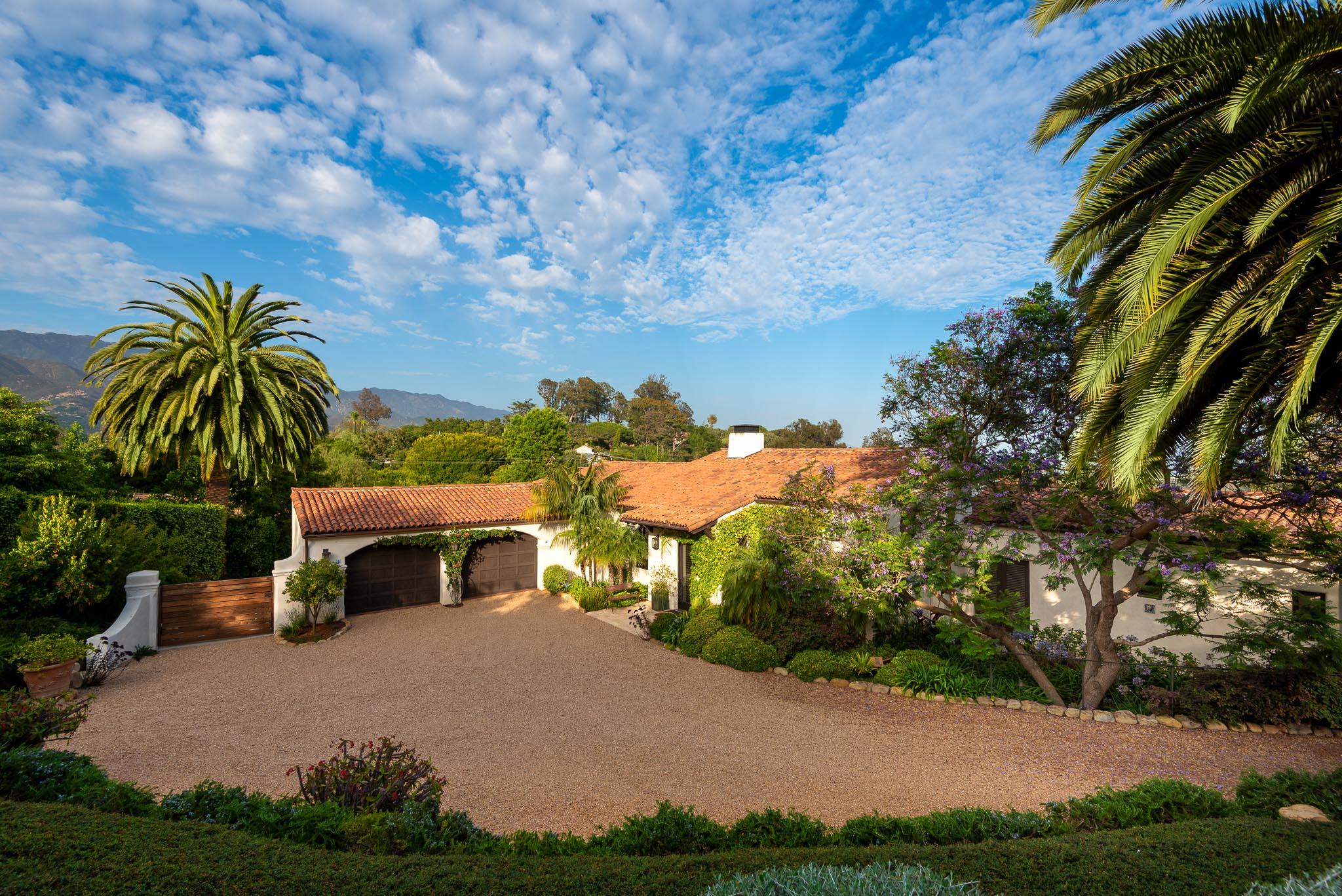 698 El Rancho Road Montecito, CA 93108 - Photo 4 of 24 a house with trees in front of it