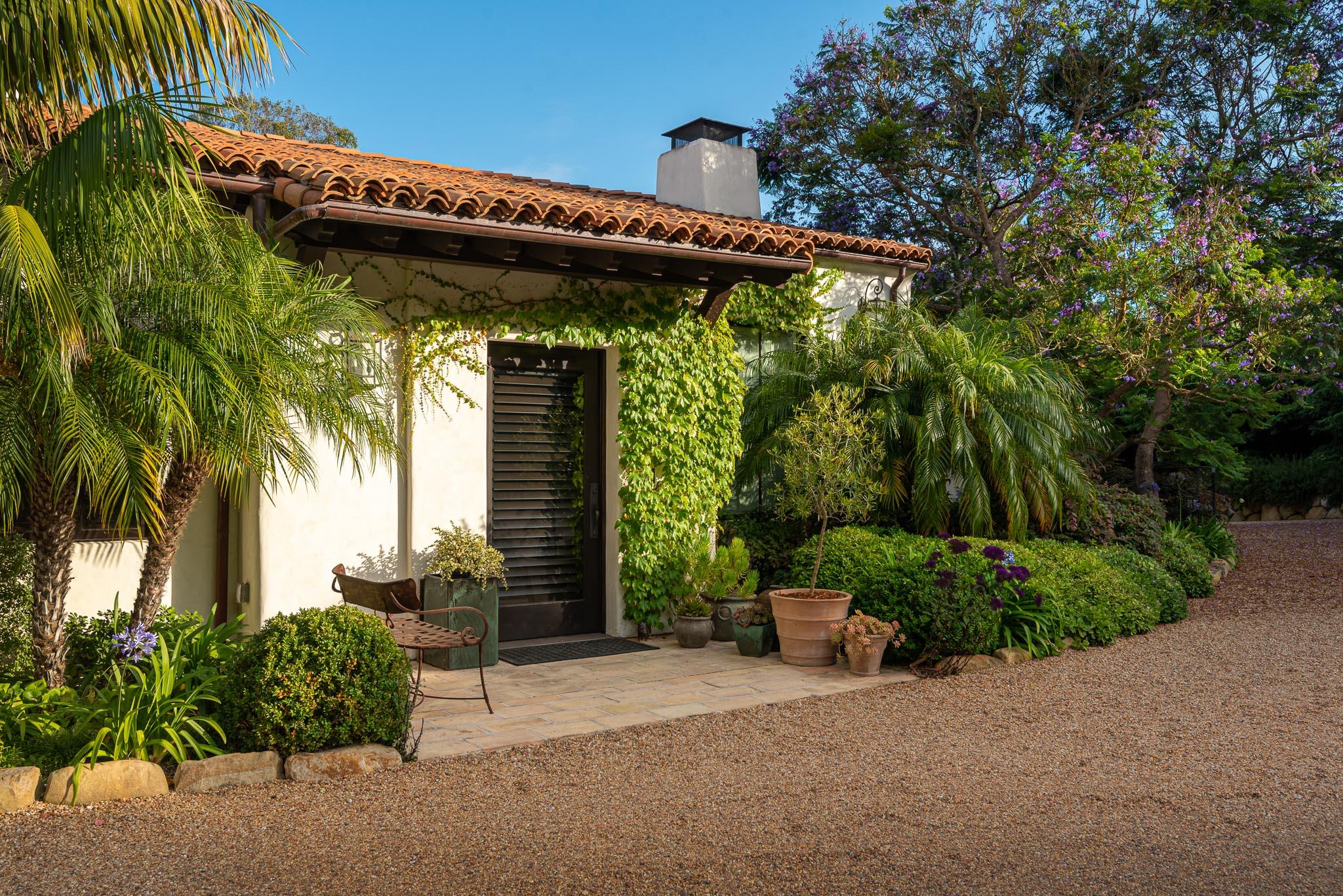 698 El Rancho Road Montecito, CA 93108 - Photo 6 of 24 a view of a wooden door and chair