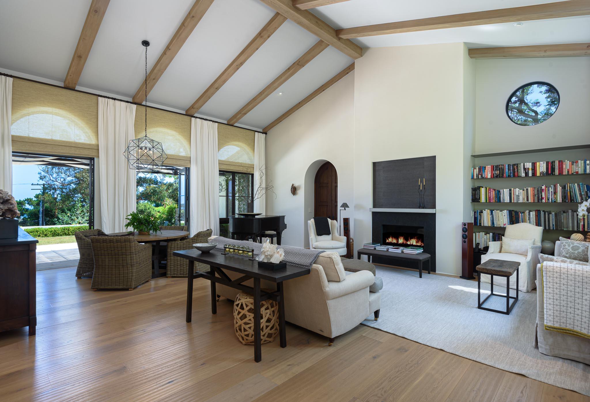 698 El Rancho Road Montecito, CA 93108 - Photo 7 of 24 a living room with furniture or couch and a fireplace