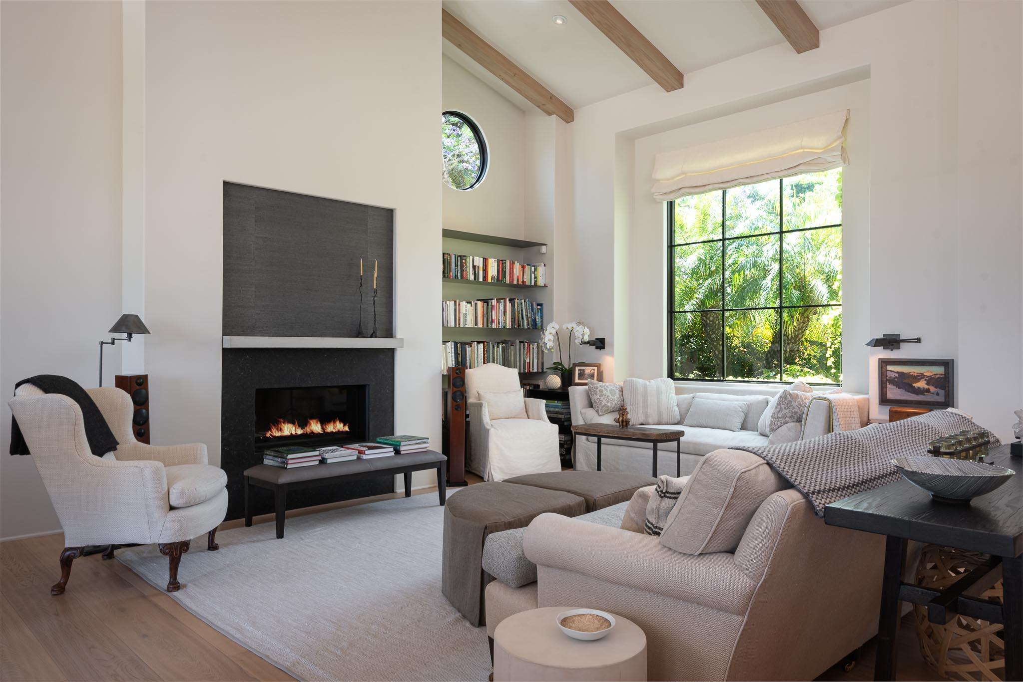 698 El Rancho Road Montecito, CA 93108 - Photo 8 of 24 a living room with furniture and a fireplace