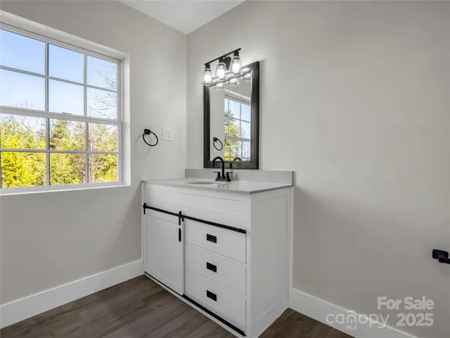 a view of livingroom with furniture and window