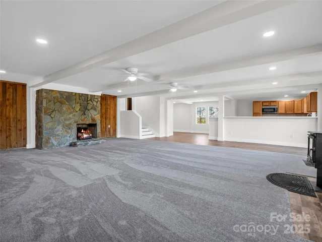 a view of a livingroom with a furniture and window