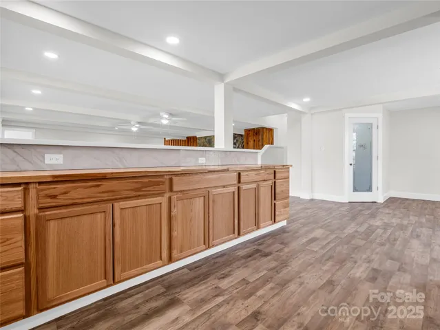 a kitchen with white cabinets