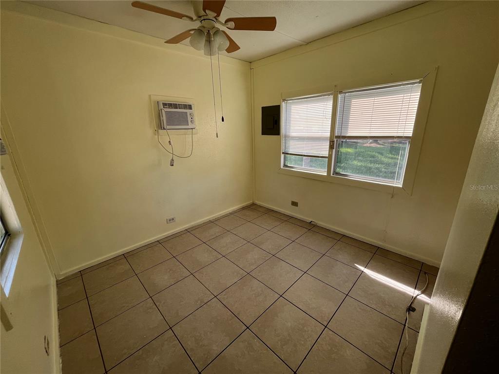 11127 McMullen Road Riverview, FL 33569 - Photo 13 of 23 a view of an empty room with a window