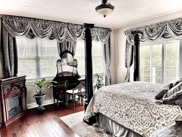 a kitchen with a stove a sink and a microwave