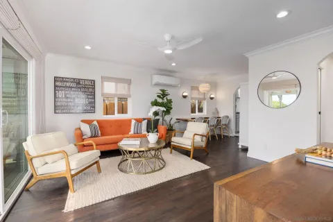 a bedroom with a bed and a chair