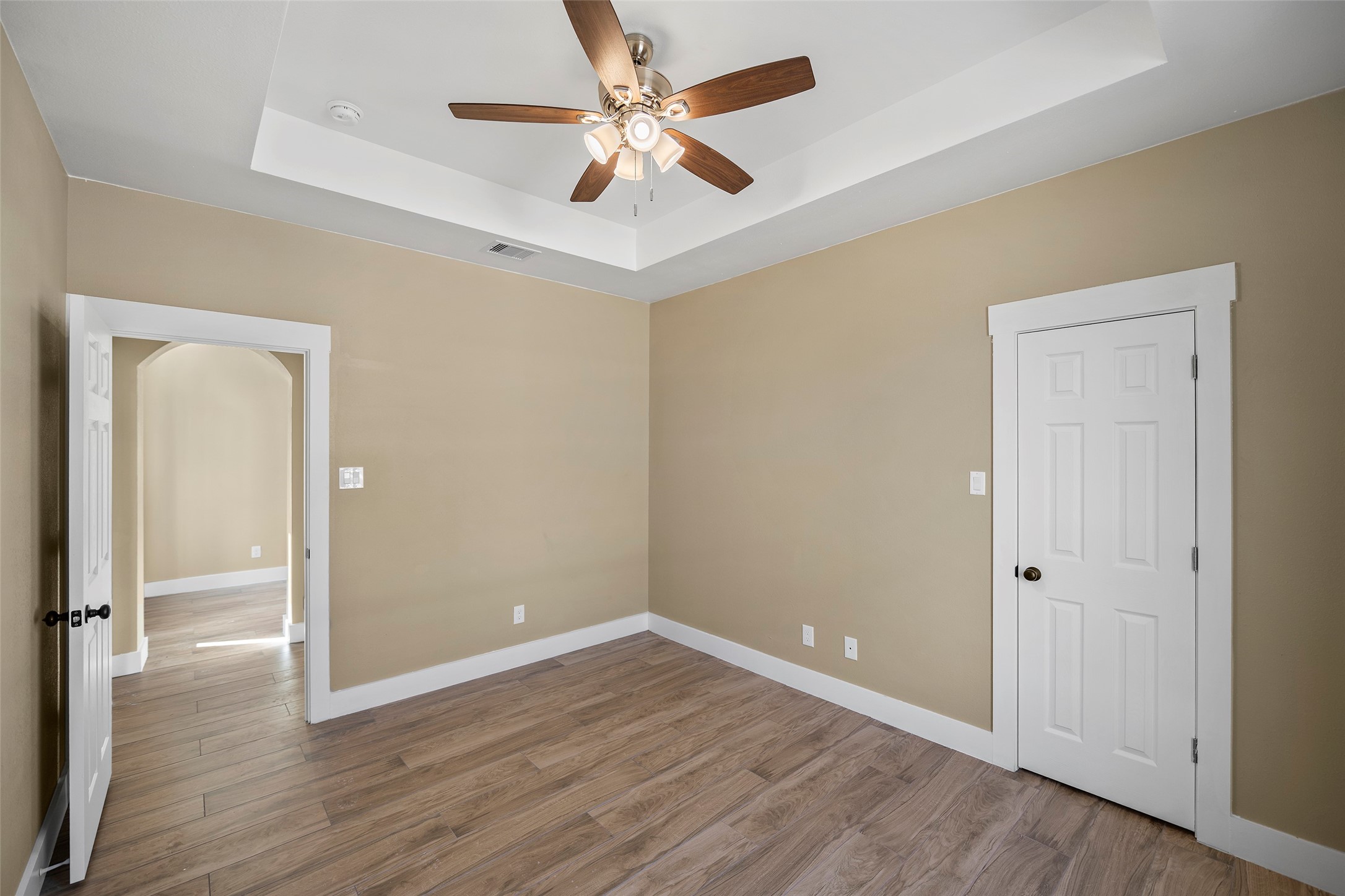 24630 Cavan Street Hempstead, TX 77445 - Photo 12 of 31 a view of an empty room with wooden floor
