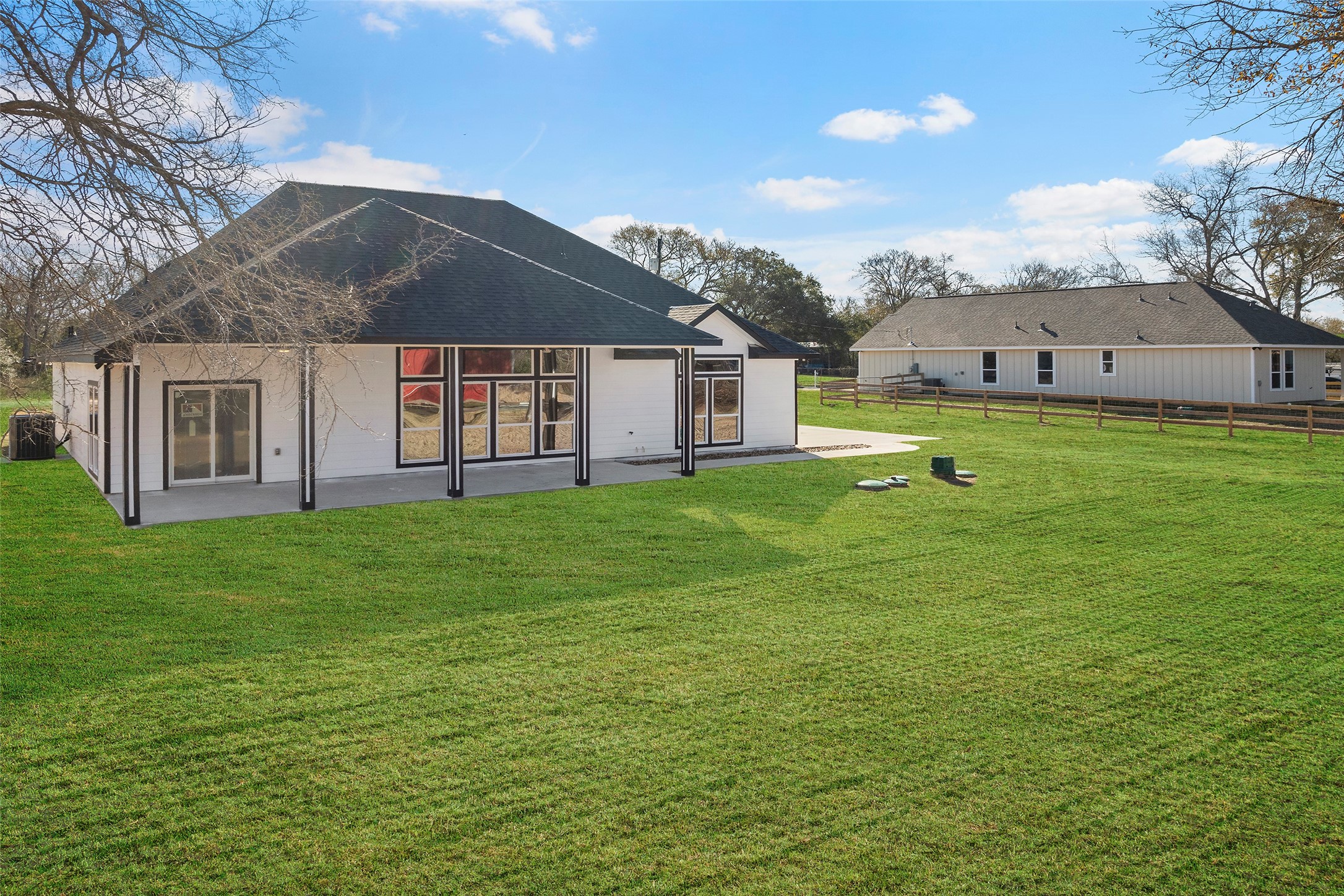 24630 Cavan Street Hempstead, TX 77445 - Photo 20 of 31 a front view of house with yard and trees in the background