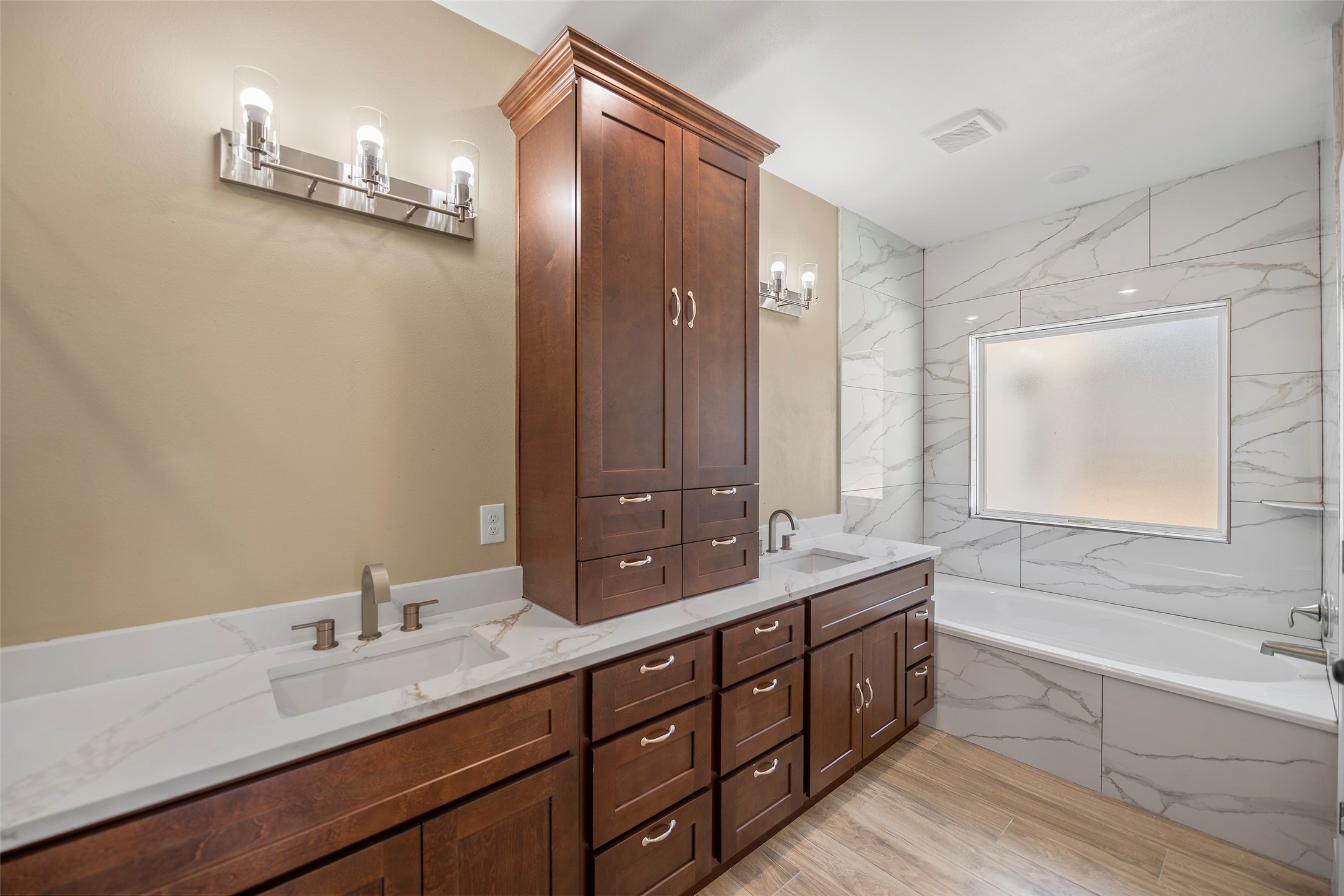 24630 Cavan Street Hempstead, TX 77445 - Photo 24 of 31 a bathroom with a double vanity sink and mirror