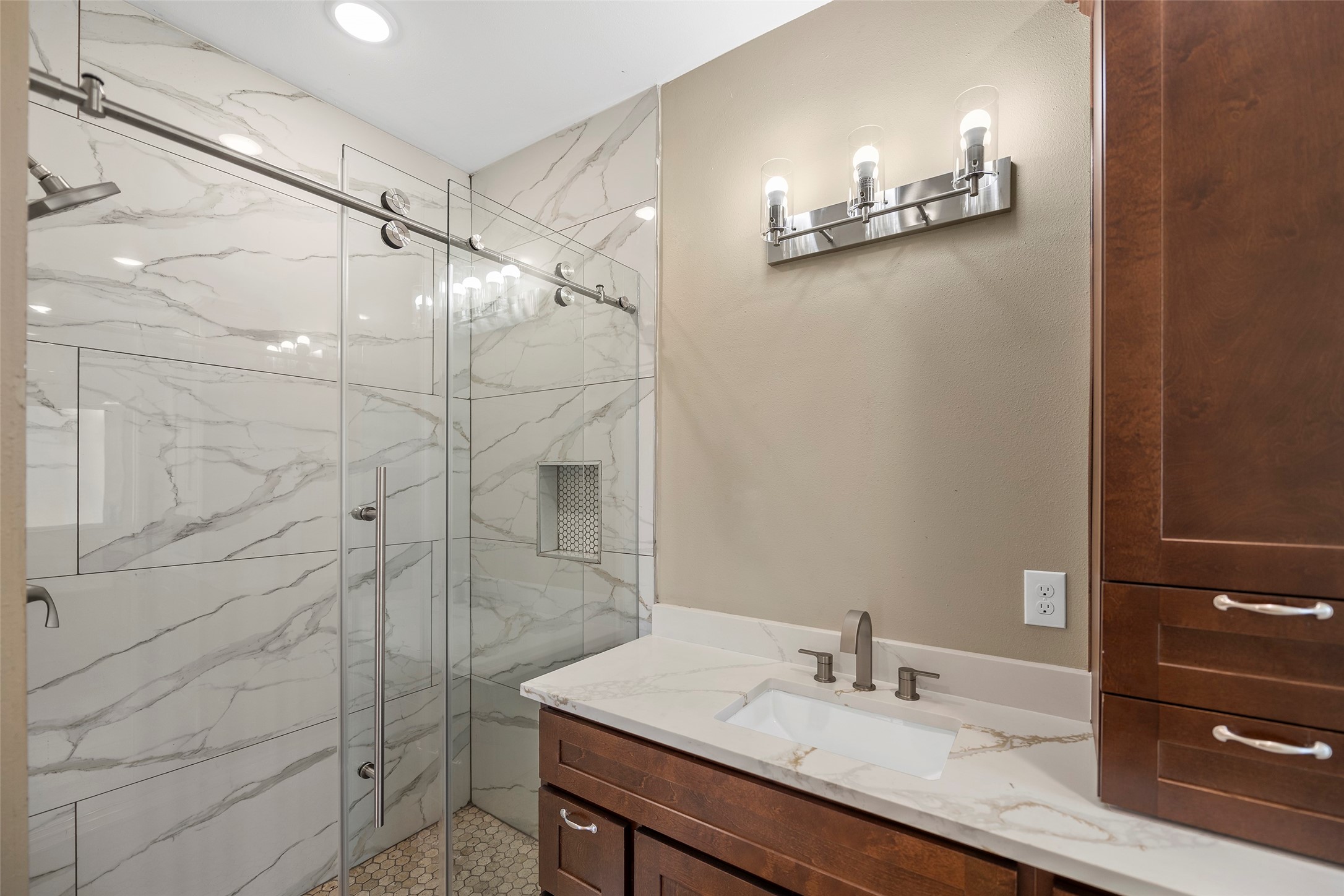 24630 Cavan Street Hempstead, TX 77445 - Photo 26 of 31 a bathroom with a sink and a mirror