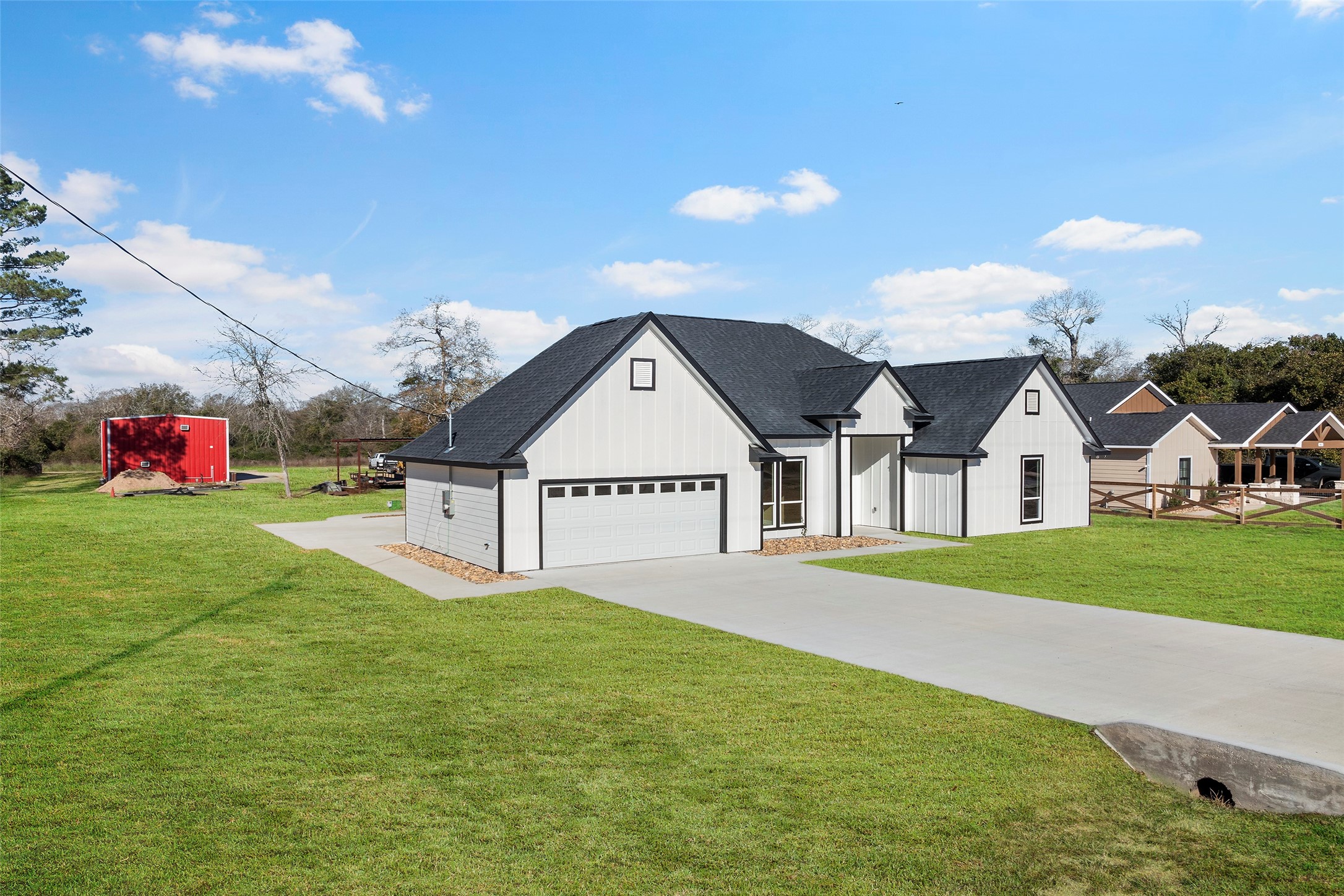 24630 Cavan Street Hempstead, TX 77445 - Photo 30 of 31 a view of house with yard and entertaining space