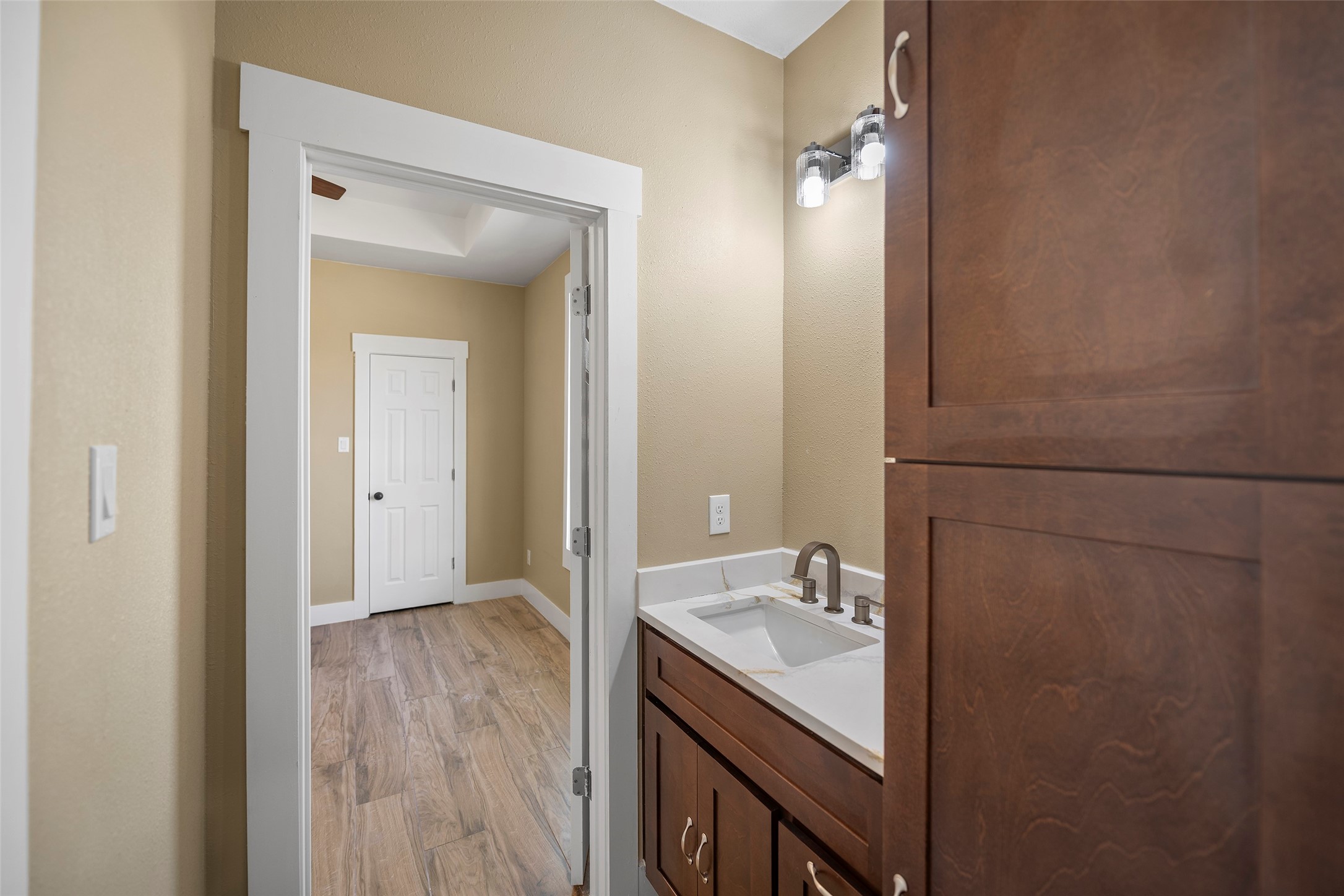 24630 Cavan Street Hempstead, TX 77445 - Photo 10 of 31 a bathroom with a granite countertop sink and a mirror