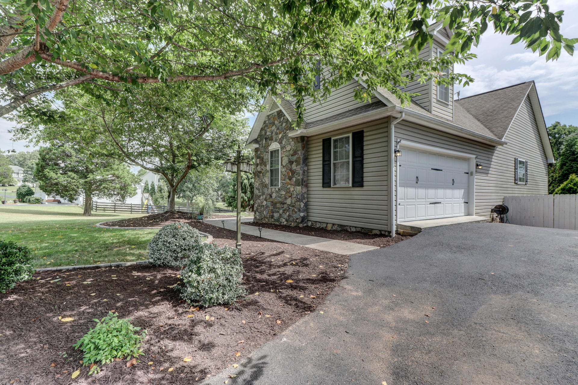 1275 Virginia Ridge Drive Hardy, VA 24101 - Photo 2 of 44 a front view of a house with a yard
