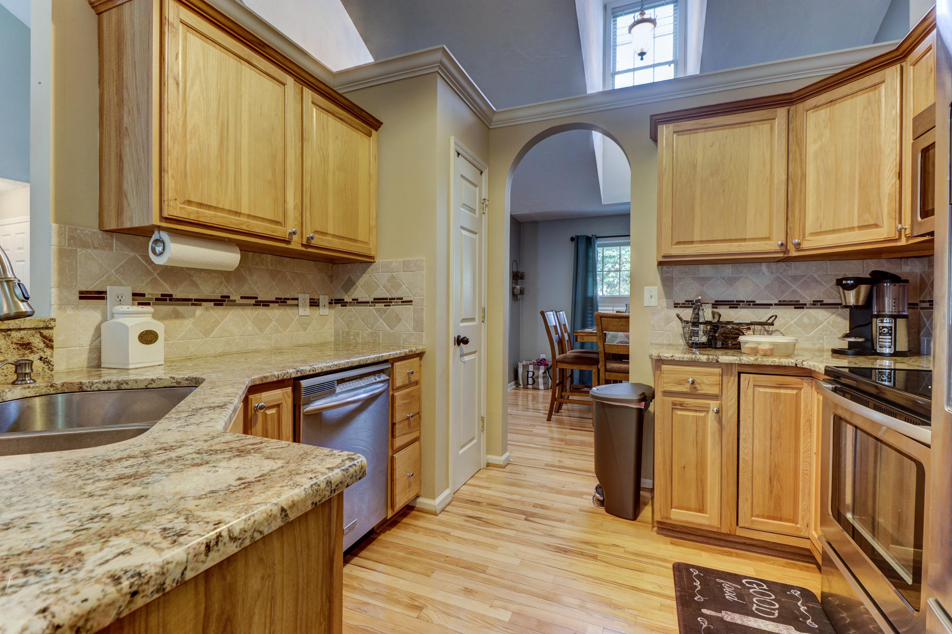 1275 Virginia Ridge Drive Hardy, VA 24101 - Photo 18 of 44 a kitchen with stainless steel appliances granite countertop a sink dishwasher stove and refrigerator with wooden floor