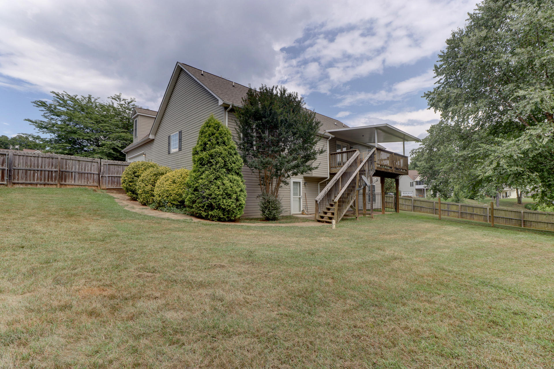 1275 Virginia Ridge Drive Hardy, VA 24101 - Photo 40 of 44 a view of a house with a yard and a garage