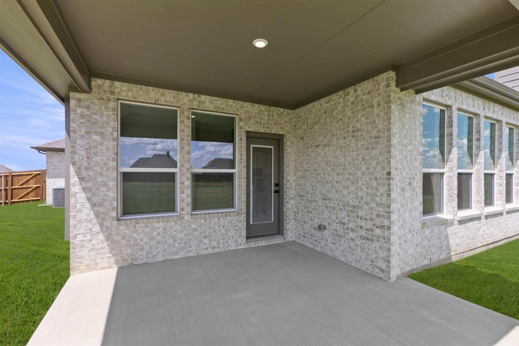 121 Mikasi Street Godley, TX 76044 - Photo 25 of 27 DFW-Coyote Crossing-Concept 2622-121 Mikasi Street-Patio-Risewell Homes-1