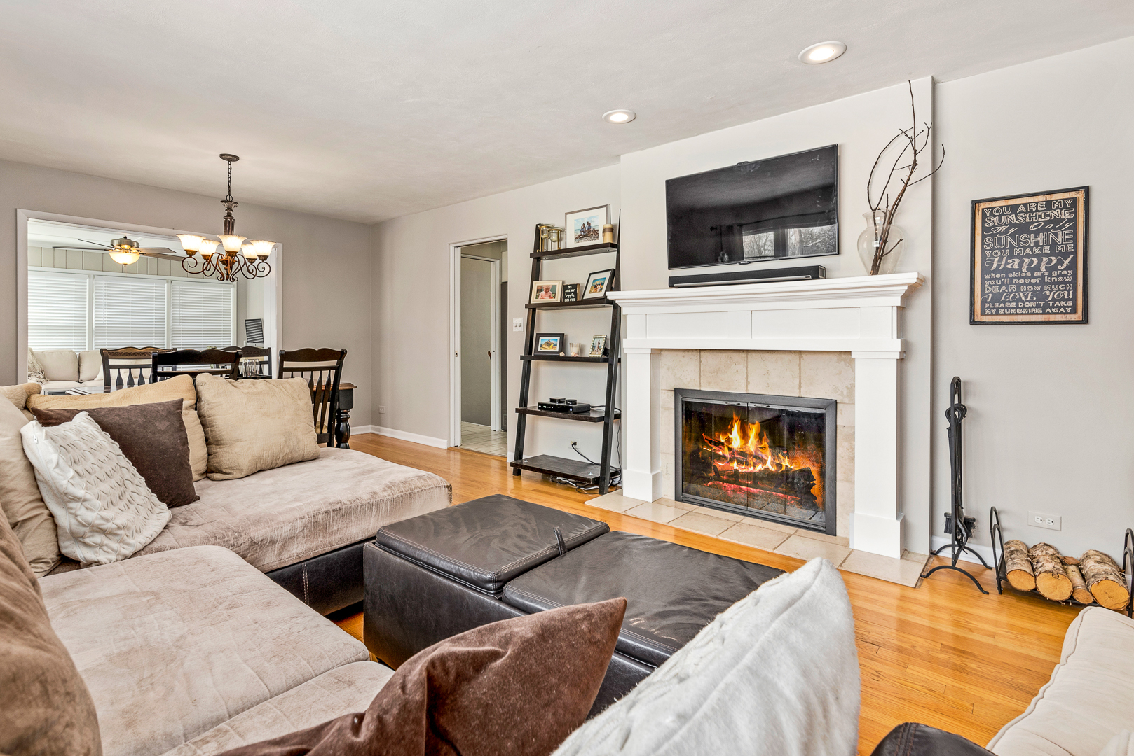 27W420 Manchester Road Winfield, IL 60190 - Photo 2 of 24 a living room with furniture and a fireplace