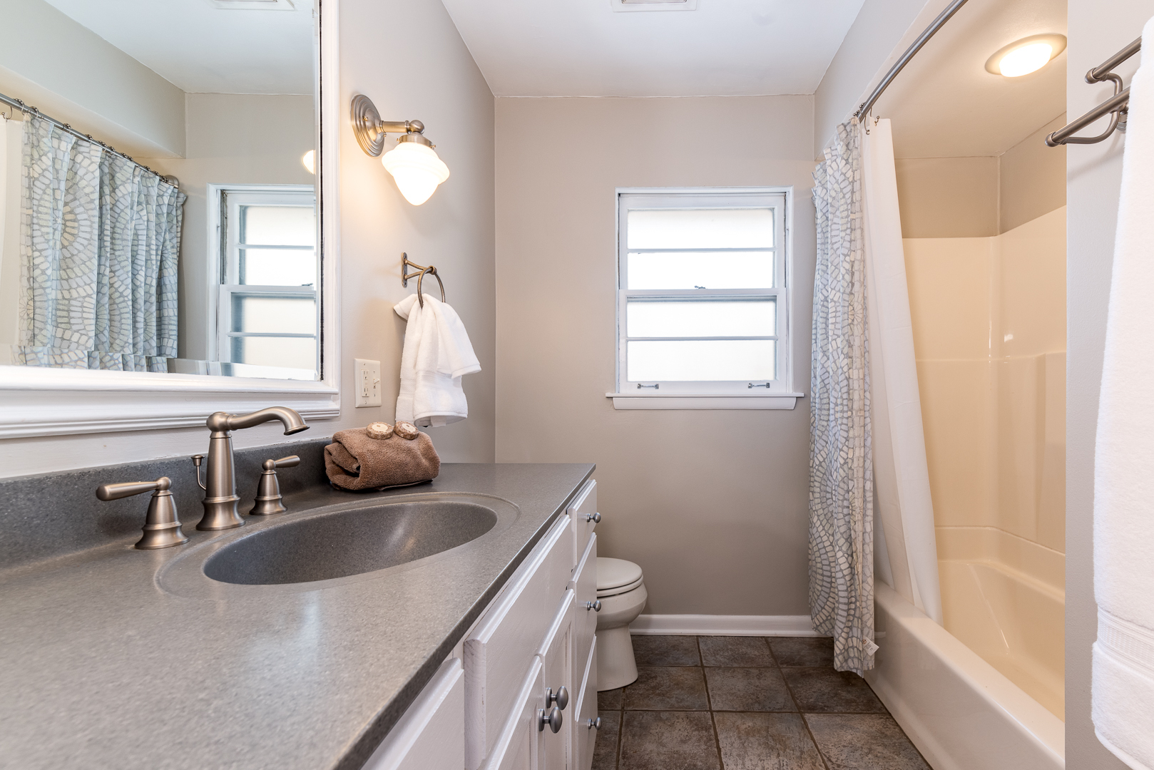 27W420 Manchester Road Winfield, IL 60190 - Photo 13 of 24 a bathroom with a sink a toilet and a window