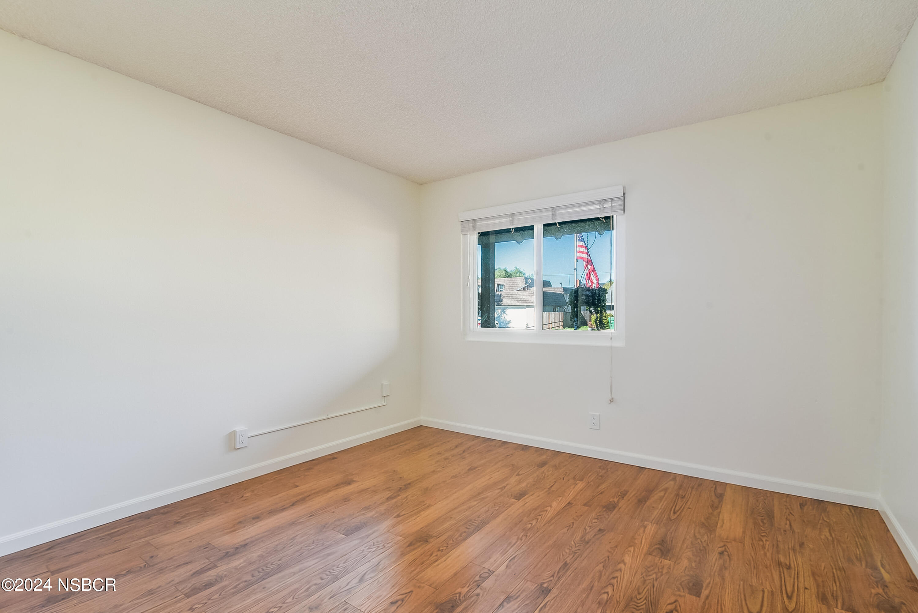 4487 Sirius Avenue Lompoc, CA 93436 - Photo 27 of 32 wooden floor in an empty room