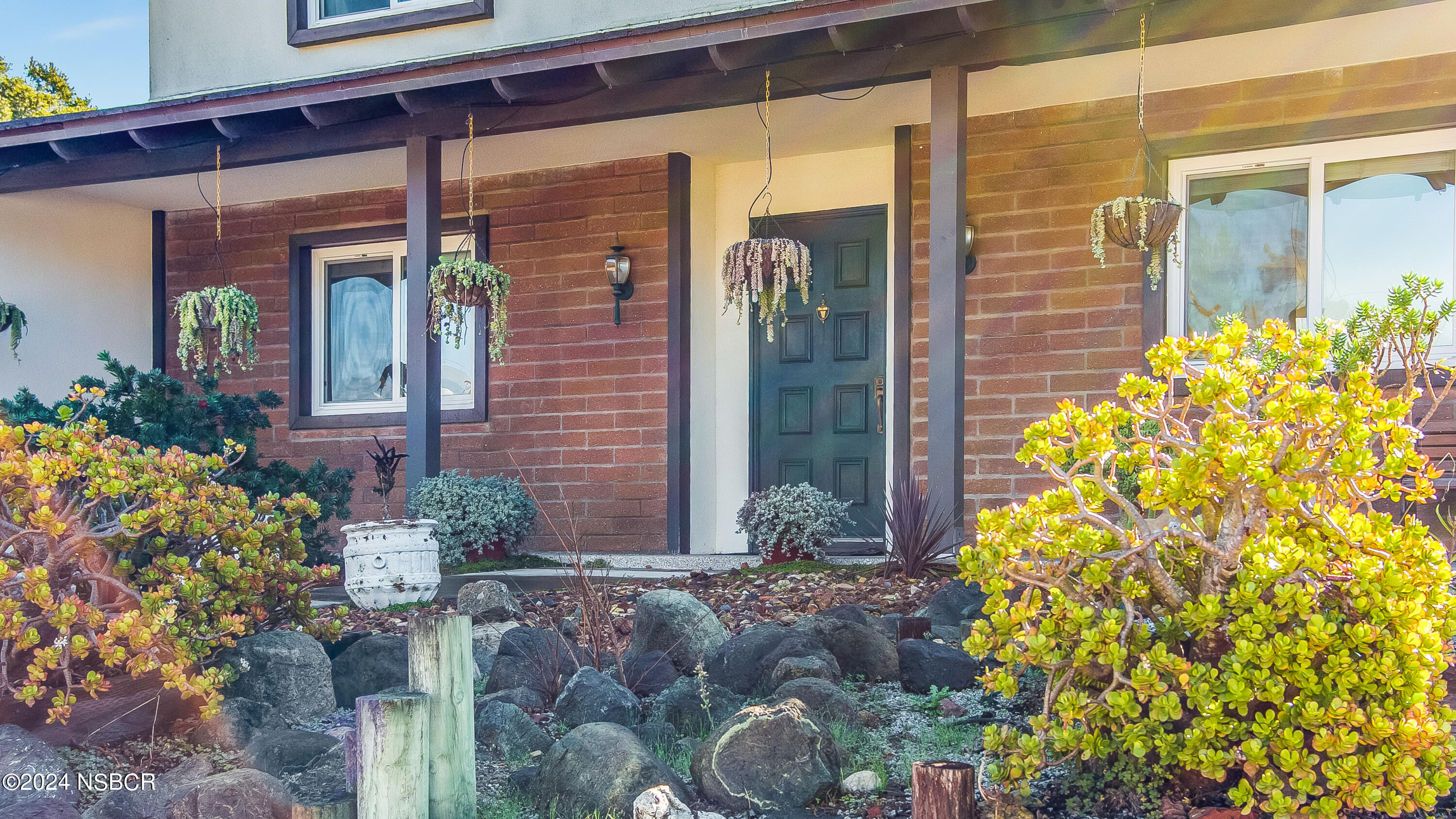 4487 Sirius Avenue Lompoc, CA 93436 - Photo 4 of 32 a front view of a house with a garden
