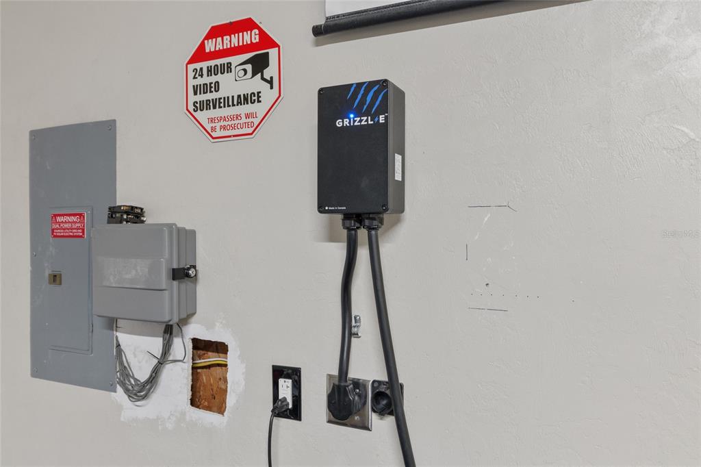 7637 Southwest 49th Place Gainesville, FL 32608 - Photo 31 of 47 a room with gym equipment and a table