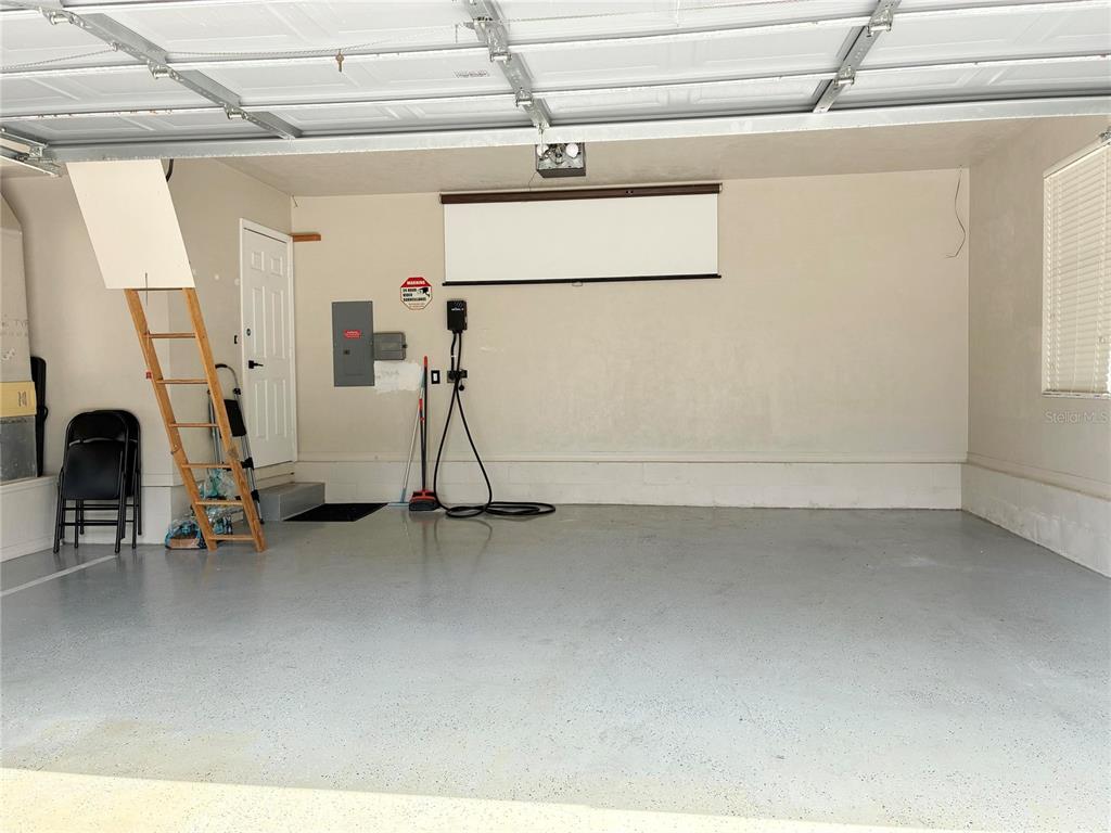 7637 Southwest 49th Place Gainesville, FL 32608 - Photo 32 of 47 a view of a room with gym equipment