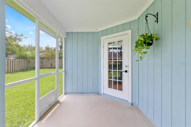a view of an entryway with a garden