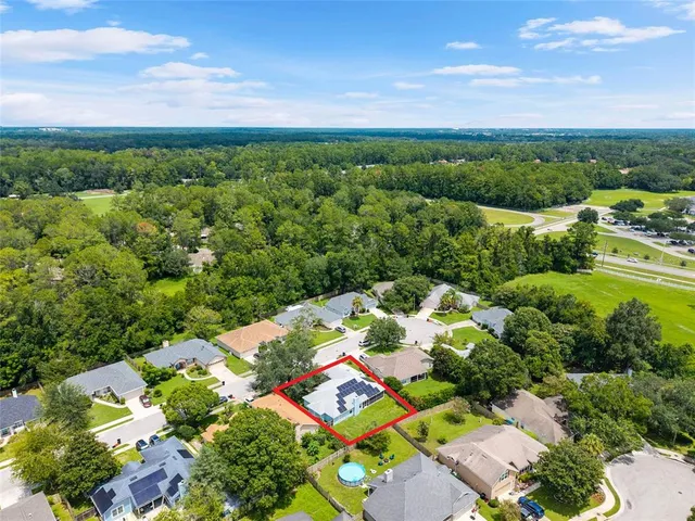 a view of a garden with a houses