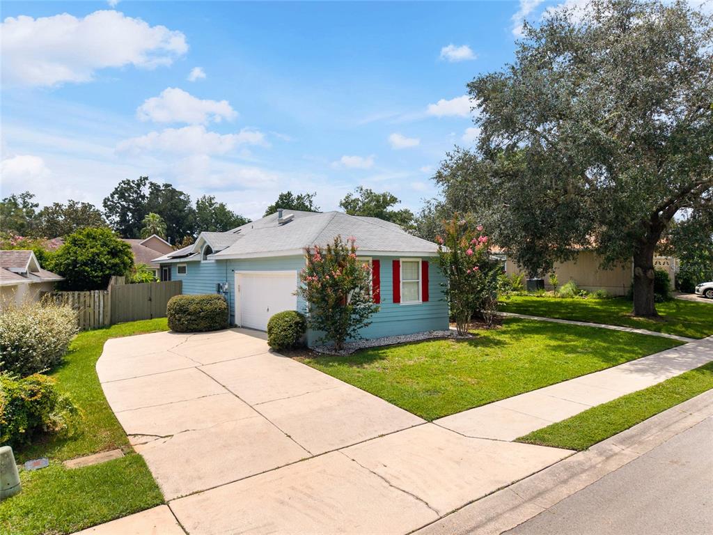 7637 Southwest 49th Place Gainesville, FL 32608 - Photo 45 of 47 a front view of house with yard