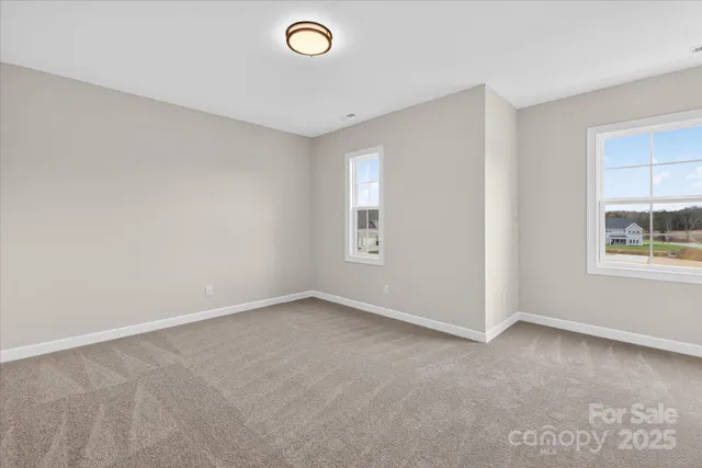 a black and white photo of a living room