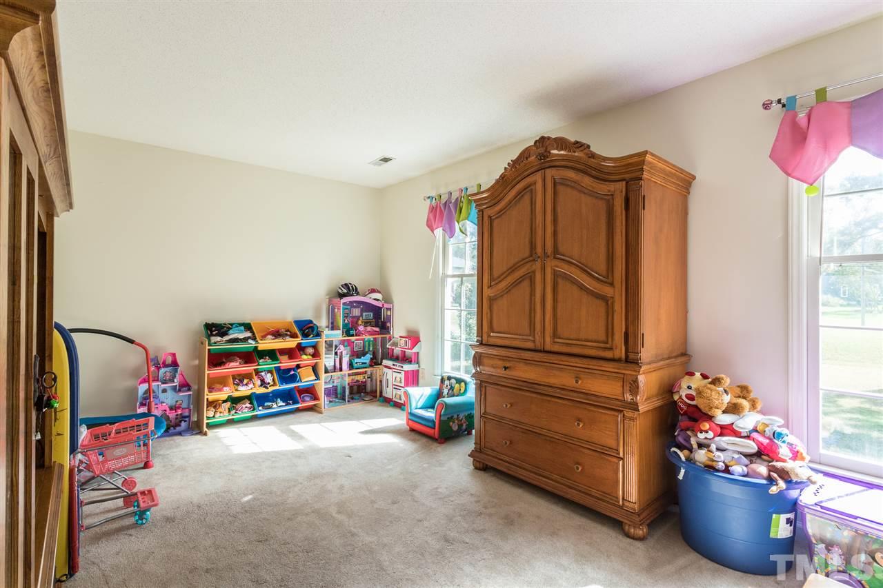 5363 Russell Road Durham, NC 27712 - Photo 23 of 28 a view of a room with toys and toys