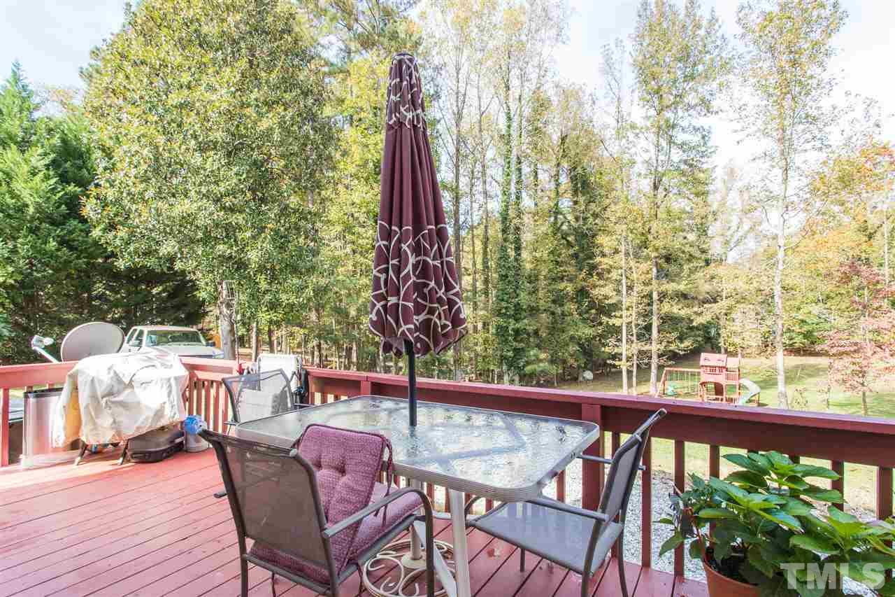 5363 Russell Road Durham, NC 27712 - Photo 24 of 28 a view of a balcony with furniture