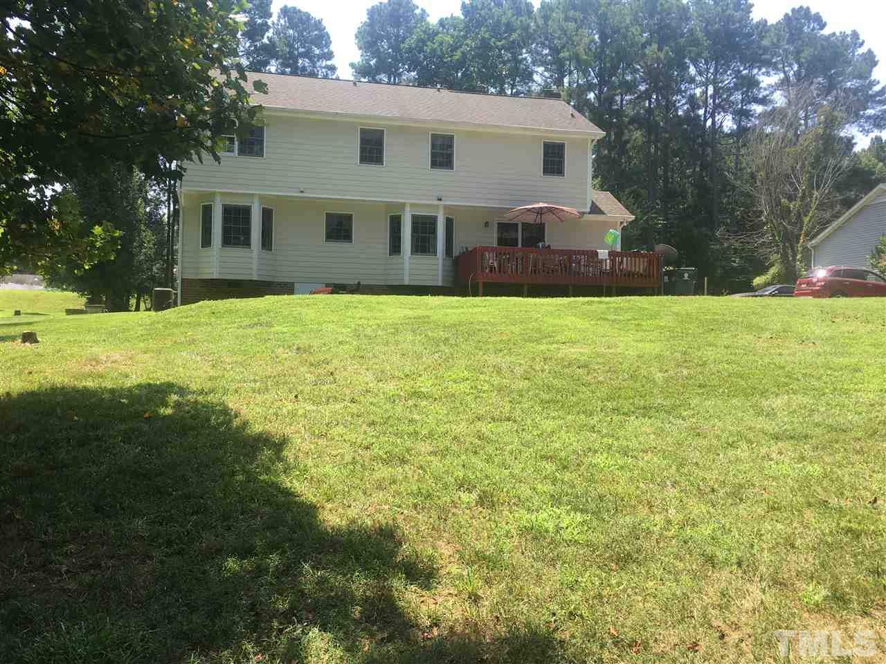 5363 Russell Road Durham, NC 27712 - Photo 25 of 28 a view of a house with a backyard