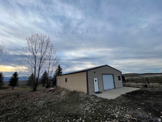 333 Lago Liberty Road Grace, ID 83241 - Photo 12 of 35 Garage featuring a view of rural / pastoral area
