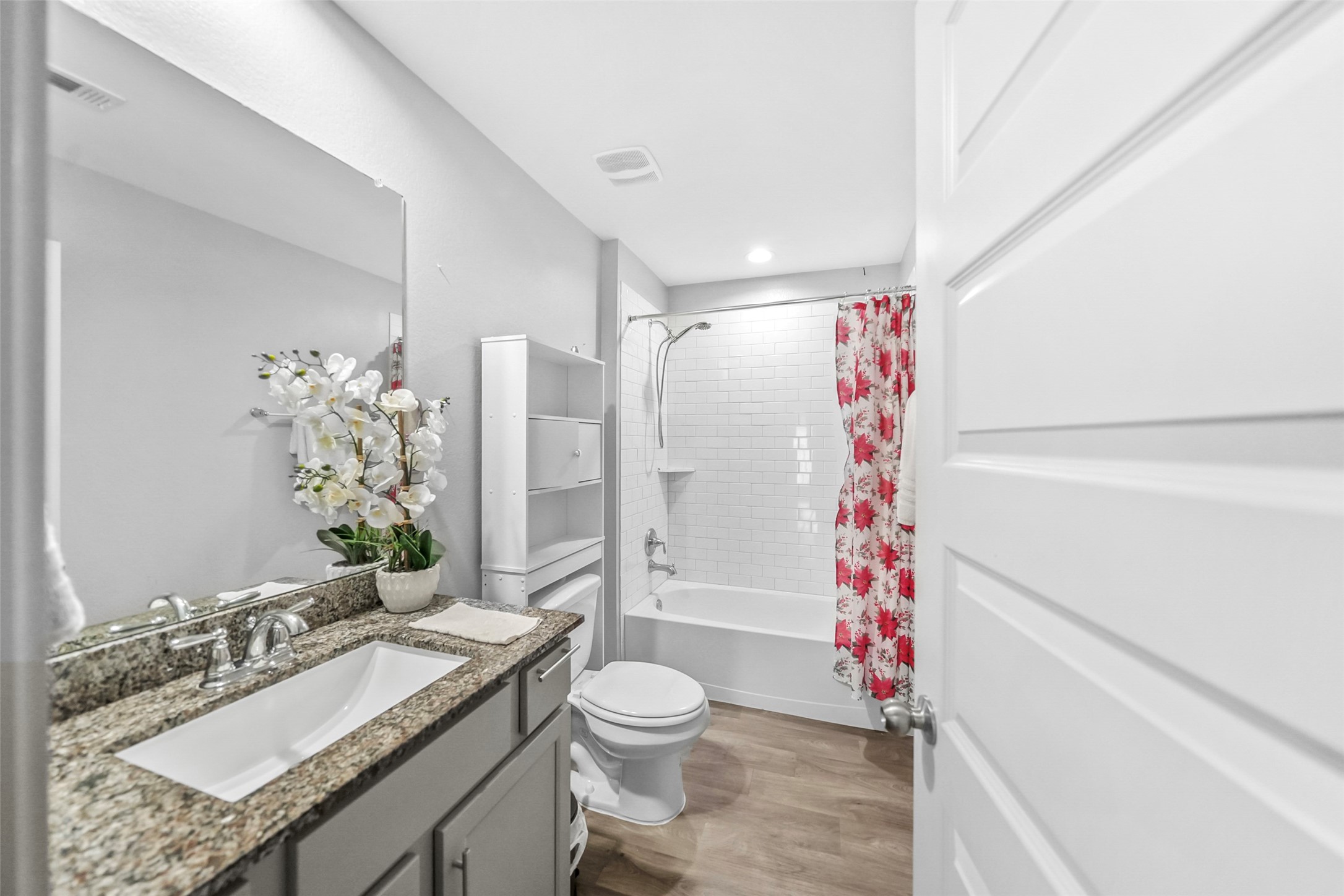 1514 Truckee River Drive Rosharon, TX 77583 - Photo 7 of 23 a bathroom with a granite countertop sink toilet mirror and shower