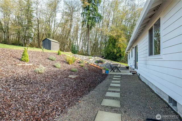 a view of a field with an trees